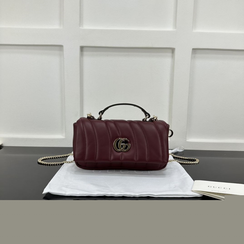 G*u*i top handle bags